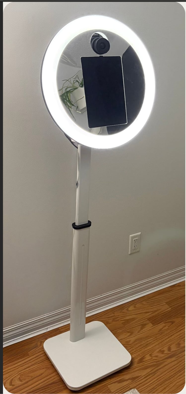 Premium DSLR photo booth with Canon camera on brown wood floor in Ottawa